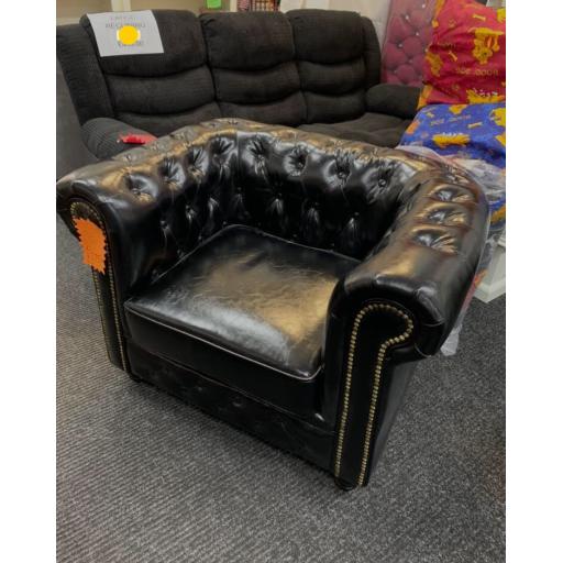 Black chesterfield style chair